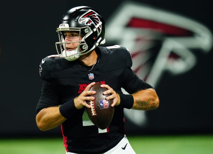 Aug 18, 2023; Atlanta, Georgia, USA; Atlanta Falcons quarterback Taylor Heinicke (4) rolls out to pass against the Cincinnati Bengals during the third quarter at Mercedes-Benz Stadium.